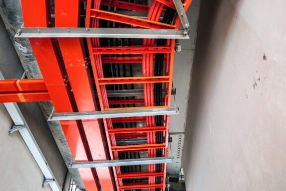 Low angle view of steel network cable trunking box.